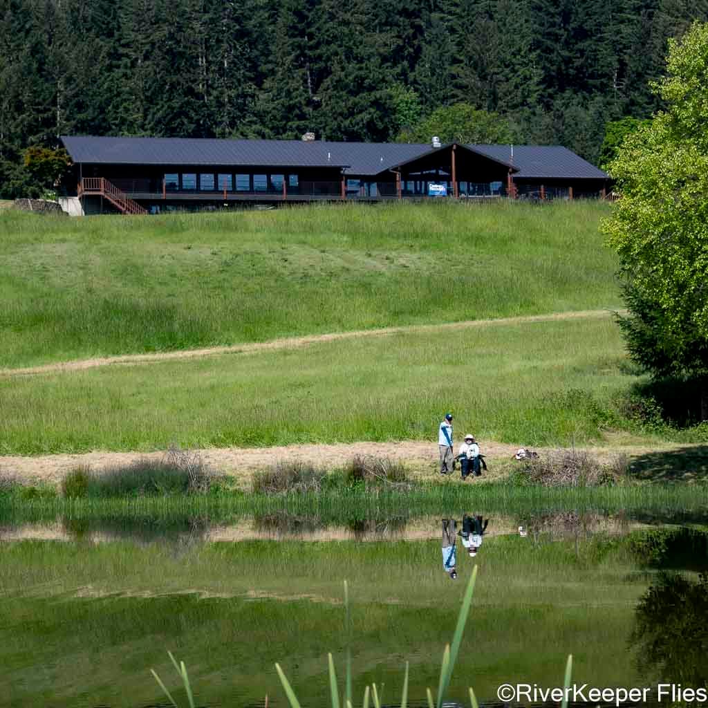 2026 CfR Retreat - Fishing with Big K Lodge in Background | www.johnkreft.com
