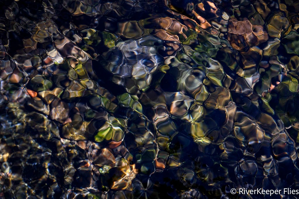Colorful Rocks on Metolius River | www.johnkreft.com