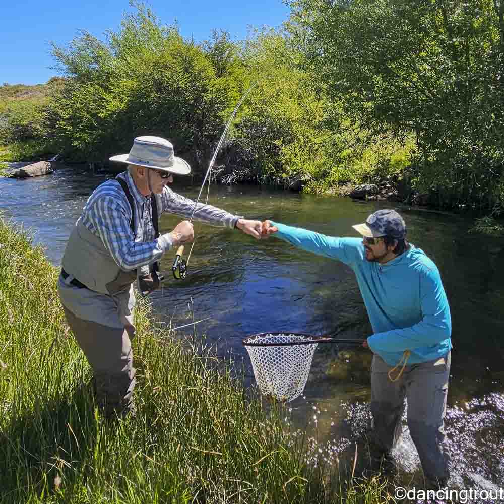 Fist Bump with Franco on Ñireco Creek | www.johnkreft.com