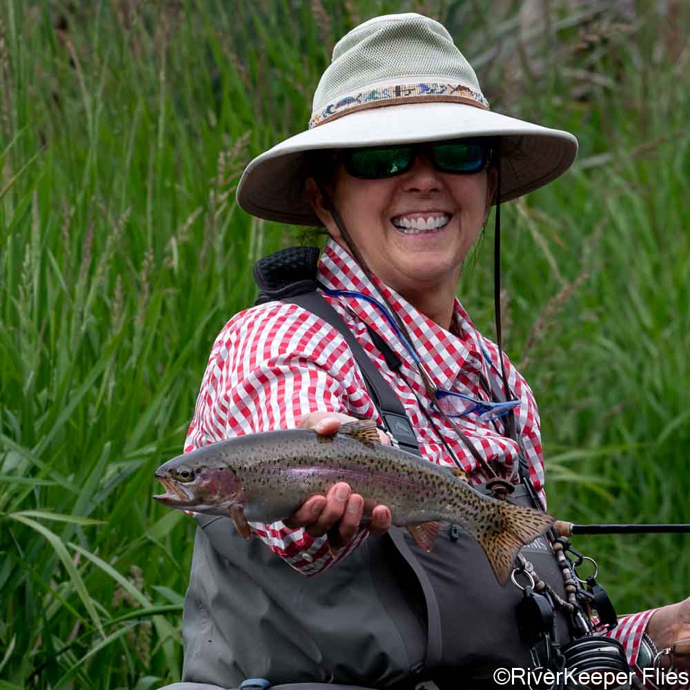 Karen with Deschutes Rainbow | www.riverkeeperflies.com